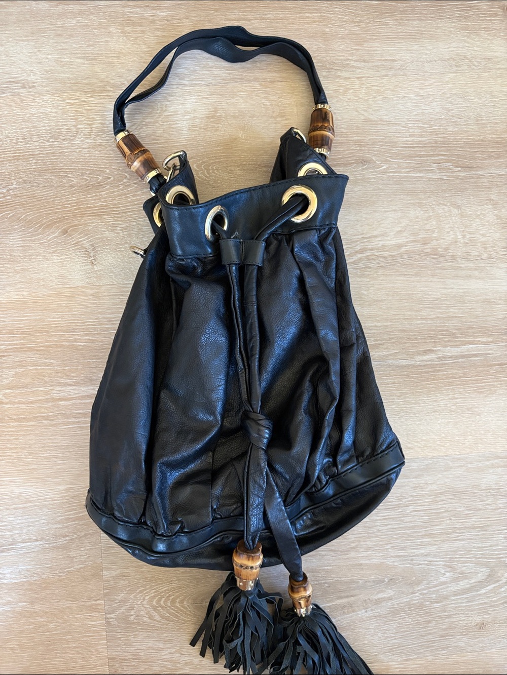 Gucci Leather Drawstring Shoulder Bag with Tassel Accents